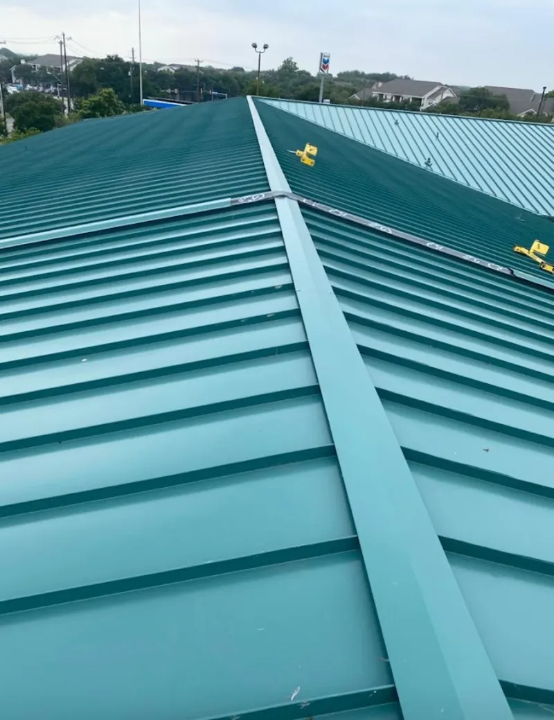 Green commercial metal roof ridge and valley for Metal Roof Repair in Fern Park
